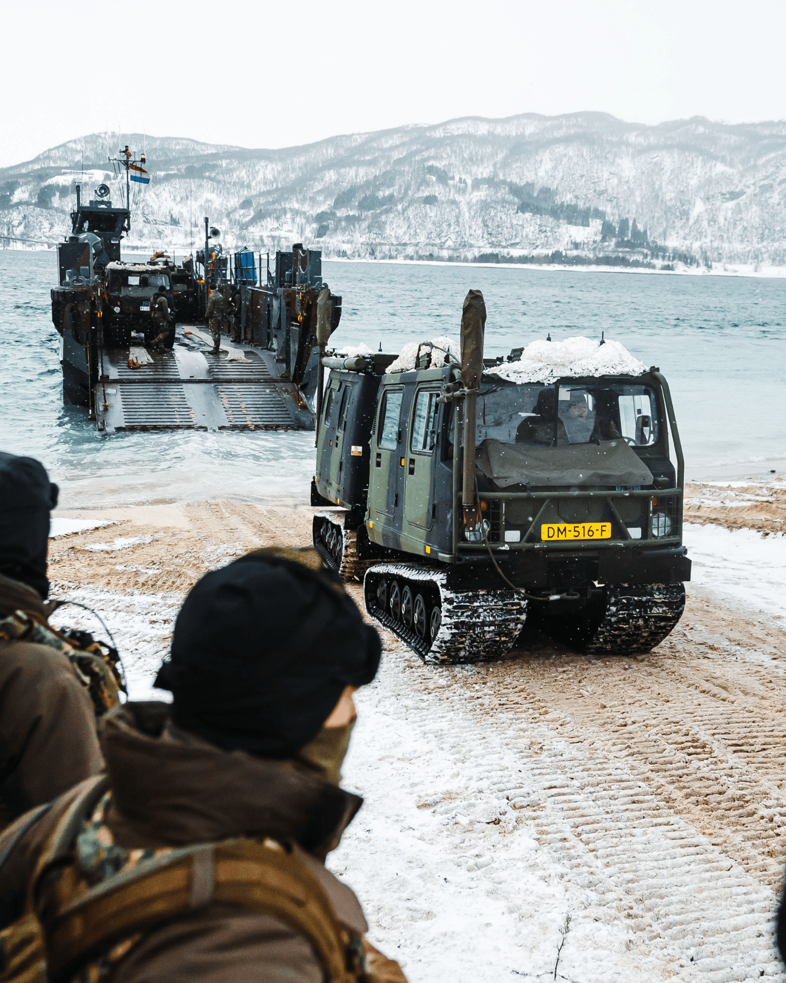A landing craft of the Dutch armed forces on a snowy shore
