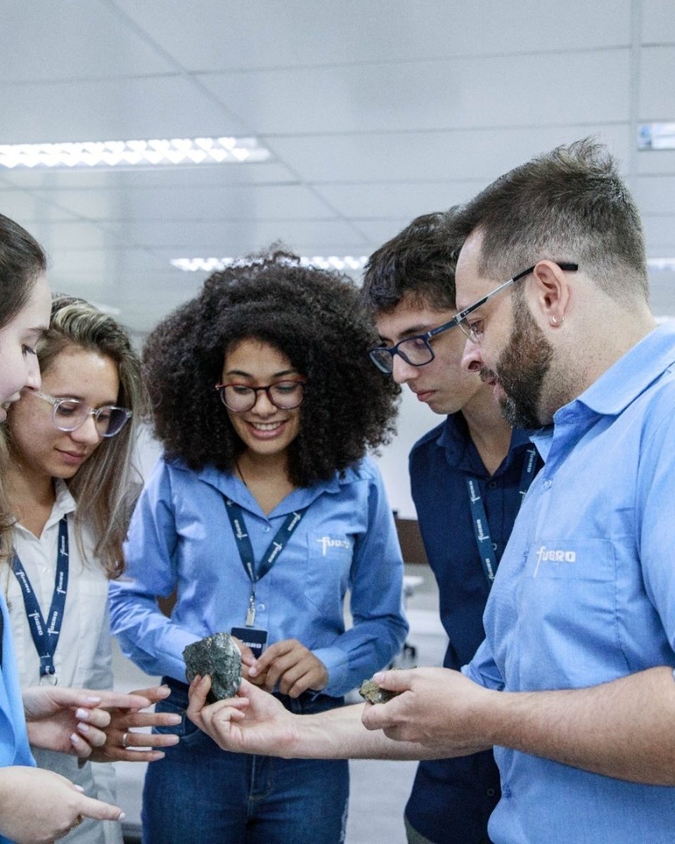 Fugro trainees examining a geodata sample in a Relevance session